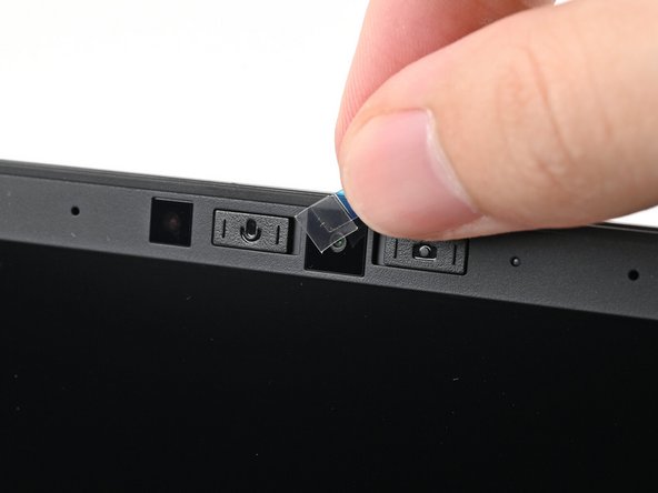 If there are any plastic liners covering the webcam and microphone, remove them.