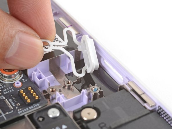Lift and remove the Power Button.