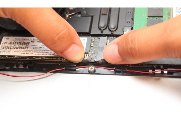 Do not completely remove the tape from the Bottom Cover, peel it back just enough to reveal the wires.