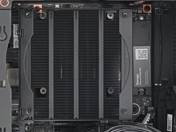 Only tighten the screws a few turns at a time to evenly compress the APU and thermal pads.