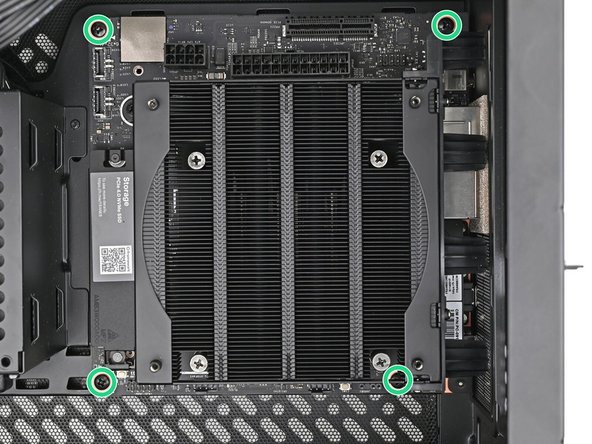 Use your Framework Desktop Screwdriver to install the four 8.2 mm‑long Phillips screws securing the Mainboard.