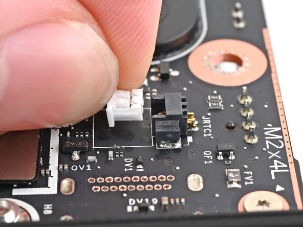 Insert the RTC battery connector into its socket and push on the edges until it's fully seated.