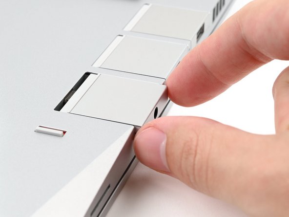 Slide an Expansion Card into an Expansion Card slot.