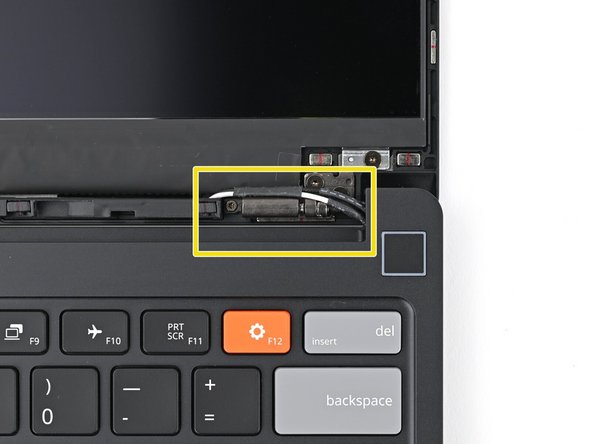 The Display Cable should be routed just above the hinge without any large gaps.