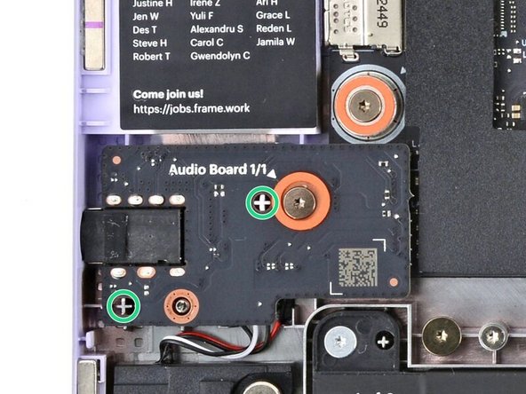 Use the two plastic alignment pins on the laptop to help with final alignment.