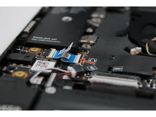 Slide the cable straight out of the connector.