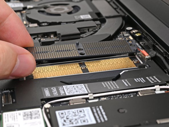Place the Interposer onto the Mainboard, making sure it slots in properly and that it sits flat surrounded by four sponges.