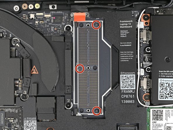 The Interposer only slots in the Mainboard one way. Use the holes in the Mainboard and the pegs in the Interposer to help orient it. The notch in the Interposer should be at the bottom left corner.
