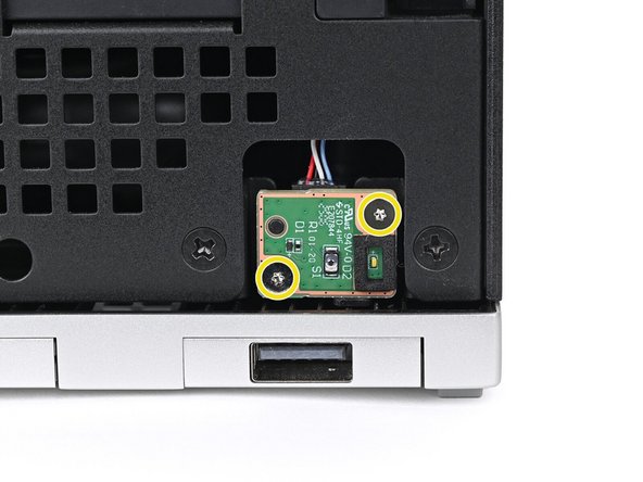 Use your Framework Desktop Screwdriver to remove the two 4.5 mm‑long screws securing the Power Button Board.