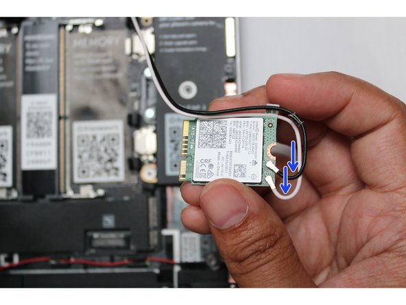 Remove the fastener and gently lift off the WiFi Bracket.