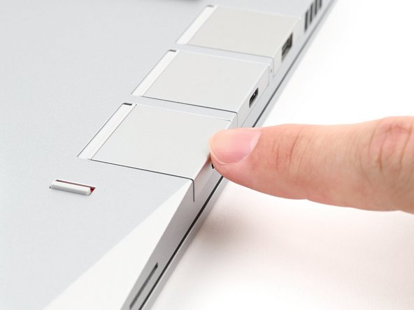 You don't need to unlock the latch to install the Expansion Cards—only when you want to remove them.