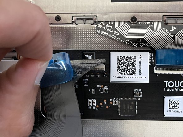 Peel up the paper or plastic backing film on the tape.