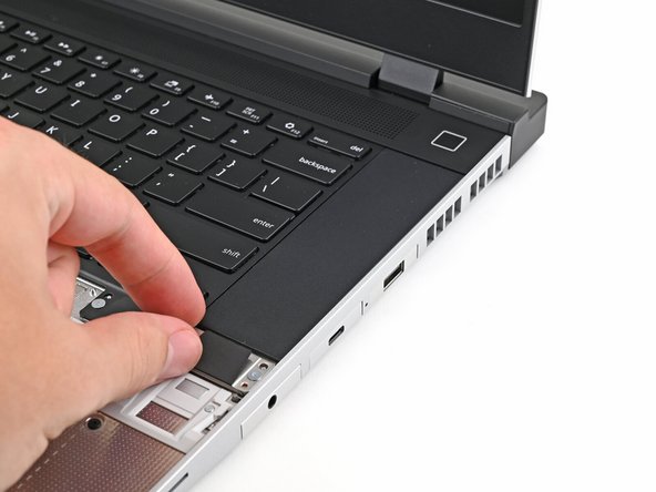 Slide the top lip of the Input Module underneath the ventilation plate and lay the module down flat to let the magnets pull it into place.