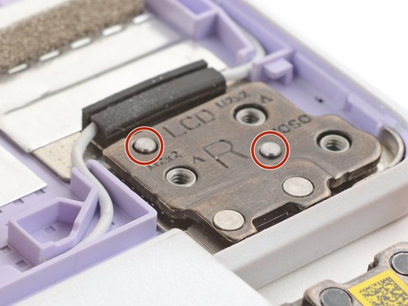 Use the alignment pins to help position each hinge in place.