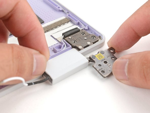 Use the alignment pins to help position each hinge in place.