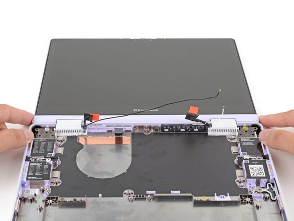 Use your fingers to lift the hinges over the Bottom Cover lip.