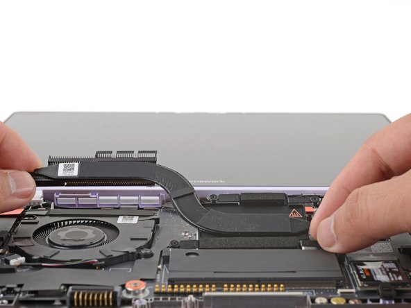 Carefully align and lay the Heatsink over the processor.