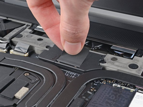 If you have the Expansion Bay Shell, use your Framework Screwdriver to tighten the three captive T5 Torx screws securing the interposer.