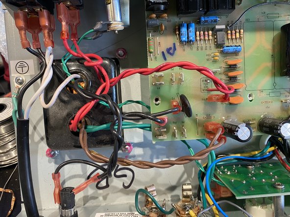 Carefully put  the Main PCB back into place making sure  the pots, switches, and LED  all line up with and  fit  snugly to the control panel.