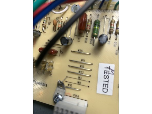 Remove R60( and the solder from the hole on the left side) and install a solder lug in the standoff screw next to R60. Using a lead clipped from the filter caps solder one end to the solder lug and the other to the left hole of R60 - see photo. It's easier to attach the lug to the screw before soldering the R60 hole.