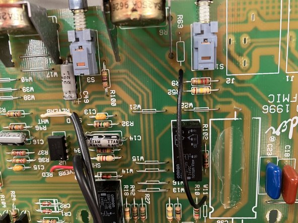 Using the 80mm wire solder one end into the top hole of W7 and the Bottom hole of R63