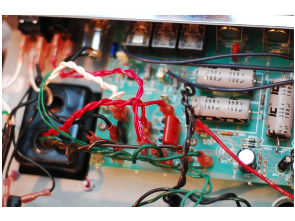 Carefully put the Main PCB back into place making sure the pots, switches, and LED all line up with and fit snugly to the control panel.