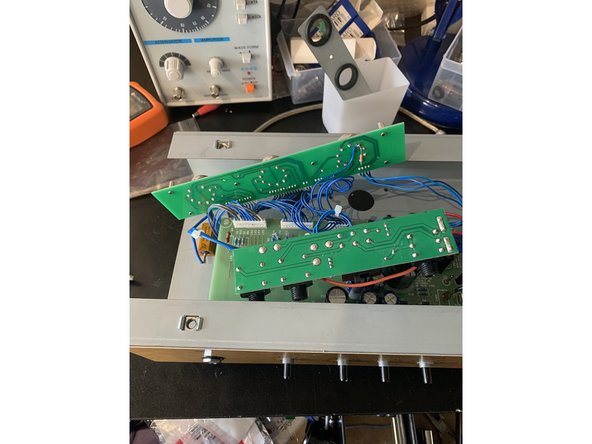 Gently push in and lift out the jacks PCB