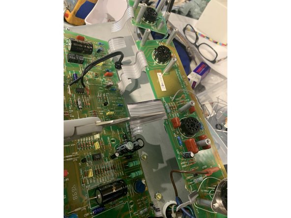 Remove ribbon cables connecting  the Tube PCB to MAIN PCB