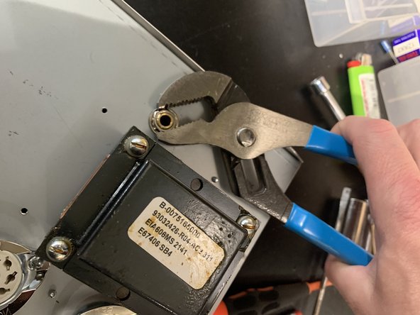 Pull  gently on the main PCB   to make sure it's not stuck to any of the standoffs that were folding the pcb screws