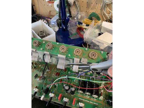 DO NOT REUSE THE RIBBON CABLE! It will not work with the new tube board. We provide instructions for replacing it.