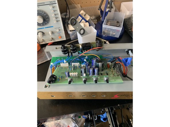 Remove the knobs, nuts, and washers from the pots