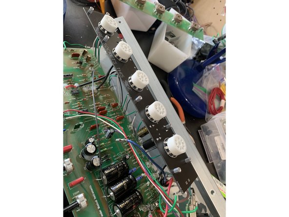 Insert the wires coming from the main PCB into the solder holes on the solder side of the  tube PCB and solder on the tube socket side. It's easiest to do this by inserting the first group and last group and soldering those first