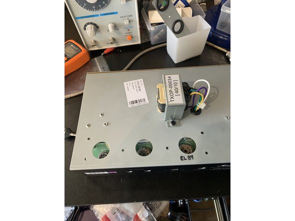 Unscrew the two stand offs and the four screws holding the tube PCB