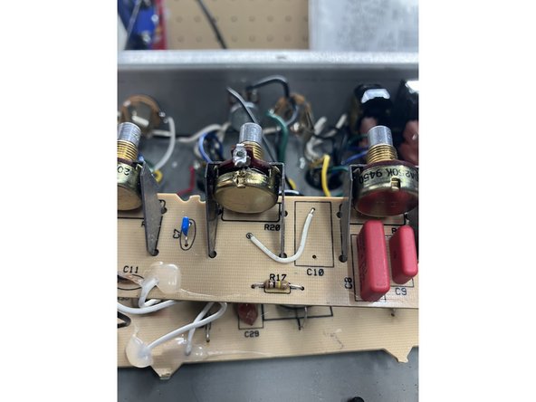 HIGHLY RECOMMENDED OPTION: For vintage Vibrolux tone controls remove C5 &amp; C10. Move the wire from the back of the treble pots to the top hole of C5 and C10. See photo. You can always leave one side stock 'custom' tone controls  and convert the other to this vintage spec. NOTE: photo only shows bright channel, but the other channel looks the same.