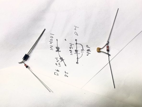 For the Diodes the arrow on the board points to the side that the band is closest to. Some of the mods require two diodes in series where there was only one before. See the photo  for how to wire this up.  1n34 + 4007 iwill be soldered like this —-1n34>—4007>.