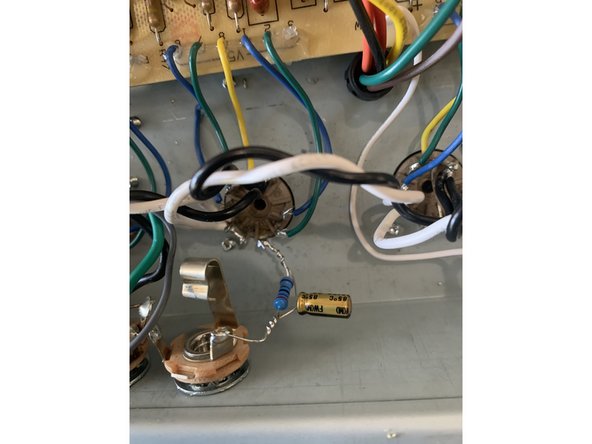 Solder the 22uf/ 50v cap to the 2.7k resistor. The voltage rating on this cap for the kits can be anywhere from 25V to 63V for this part depending on our supplier. This voltage rating is a maximum working voltage and any cap with a max voltage at least 10V would be fine here