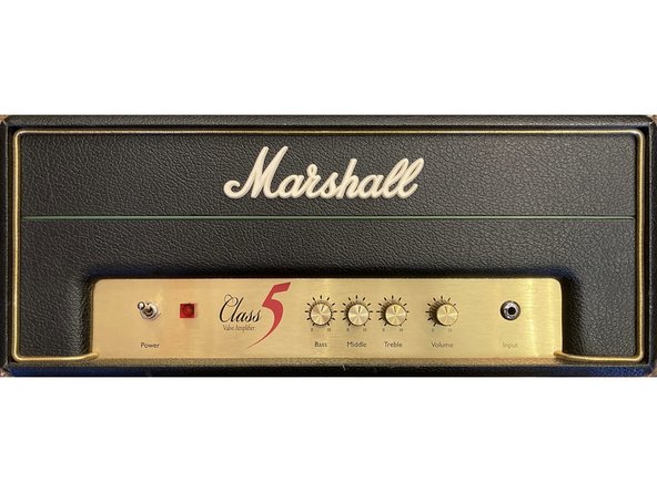 Carefully put the main PCB back in. Install the nut and washer on the input jack. Put the screw back in near the middle of the PCB and at either corner. Install washers, nuts, and knobs on the pots.