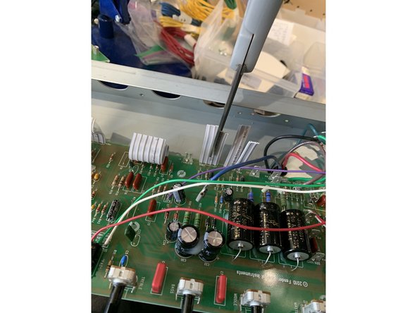 Desolder and disconnect the two green heater filament wires WJ8 and WJ9 from the stock Tube PCB