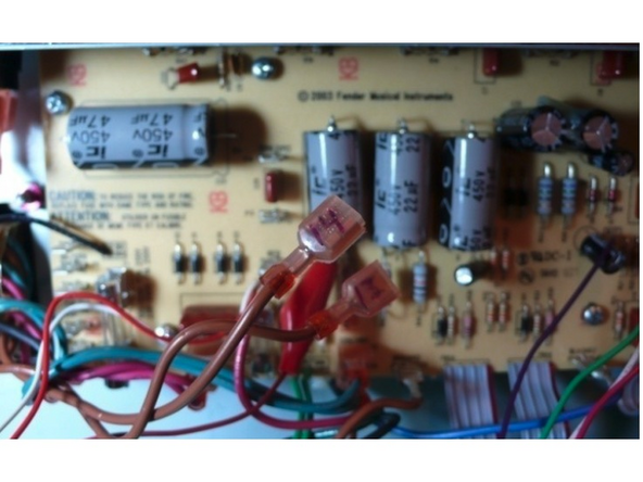 Unplug all of the quick connect leads from the choke, power, and output transformers and the switches by pulling on the quick connect firmly with steady pressure while gently rocking it from side to side. Using a pair of angled needle nosed pliers makes this much easier