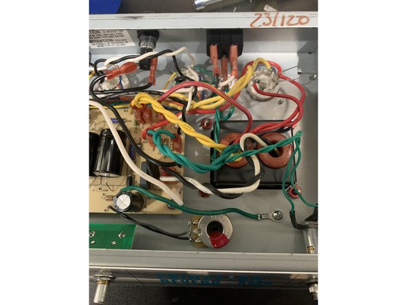 Carefully put the control panel PCB back into the front of the chassis solder side up and  fasten the washers and nuts onto the pots