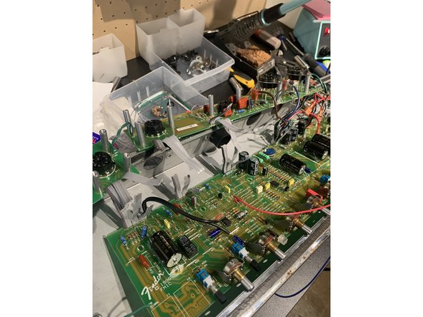 Pro Tip for ribbon cable removal: Use kitchen shears to cut the ribbon cable in half and then cut lengthwise all the way to the board separating each ribbon cable into groups of two and then clip the leads as close to the pcb as you can ON THE SOLDER SIDE of the board