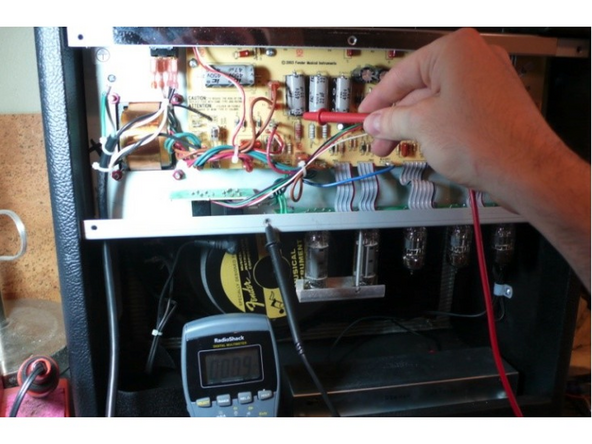 With the amp off and unplugged check to see if your caps are charged, set your multi-meter to DC and measure the voltage at the positive side of the filter cap closest to the power switch