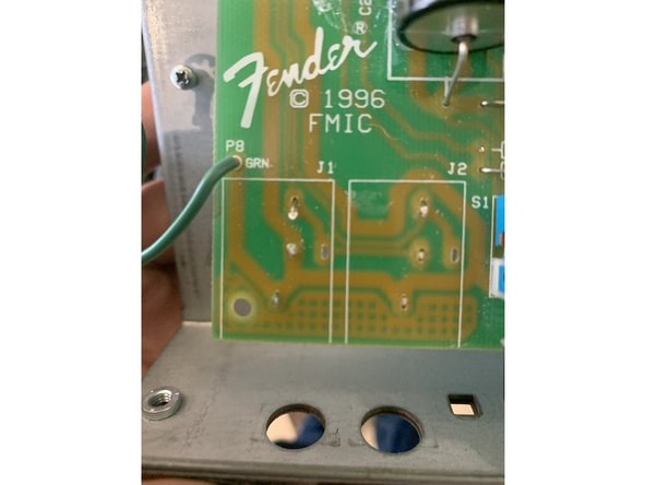 Remove the input jacks. The input jacks are snapped into the PCB. It's easiest to remove all  the solder from the solder side and then remove the jack