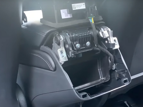 Place the panel on top of the center console.