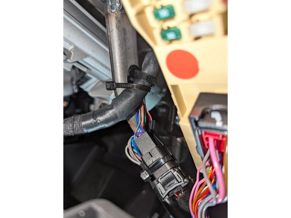 Secure excess harness as needed with cable ties.
