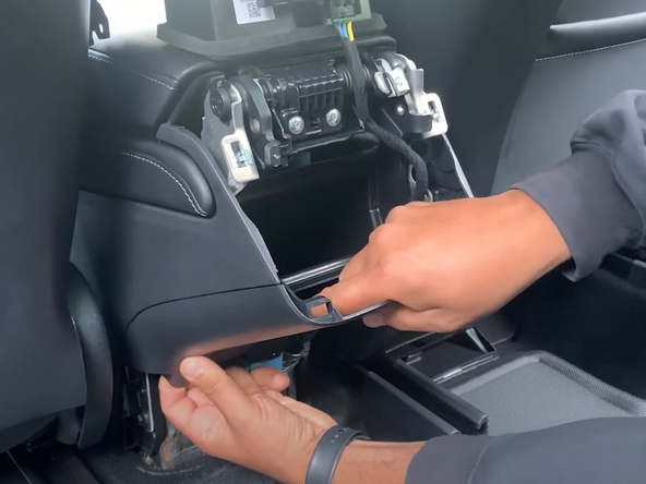 Remove the panel under the air vent using the same method.