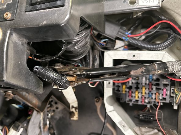 Ensure the harness does not obstruct the operation of the parking brake.