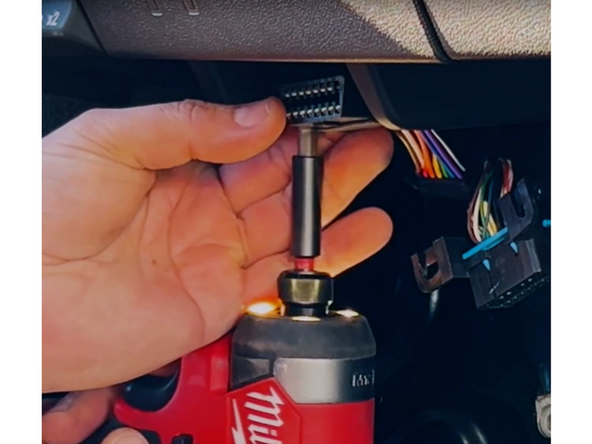 Take the female short end of the harness with the modified 1-2U adapter and mount it into the factory diagnostic port location.