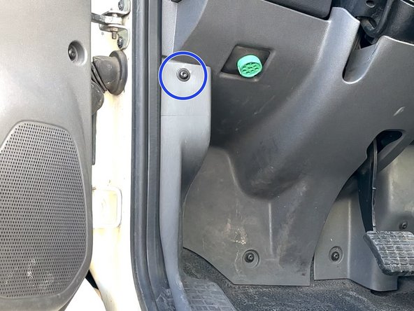 Remove (3) T-20 screws from the kick panel area.