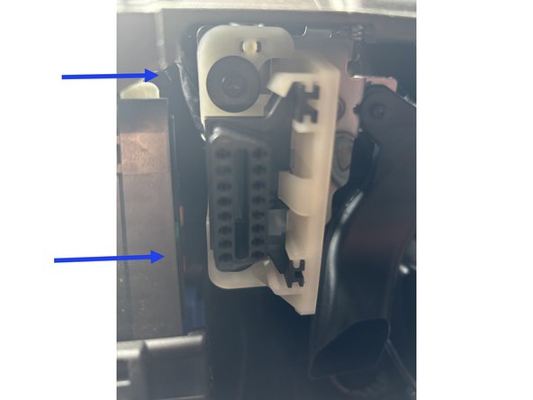 Using Tx25 remove the two screws securing the OBD assembly.